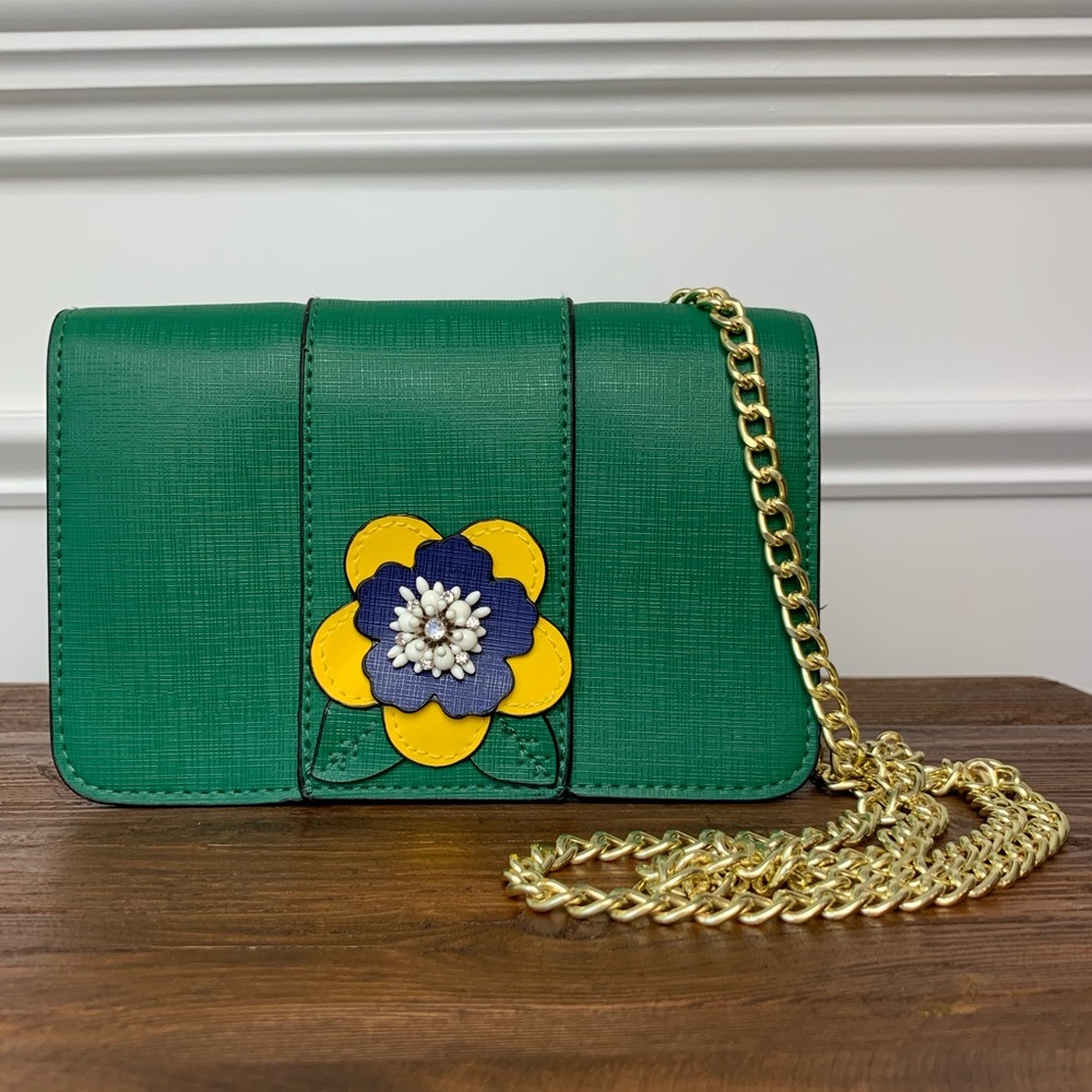Structured green purse flower appliqué